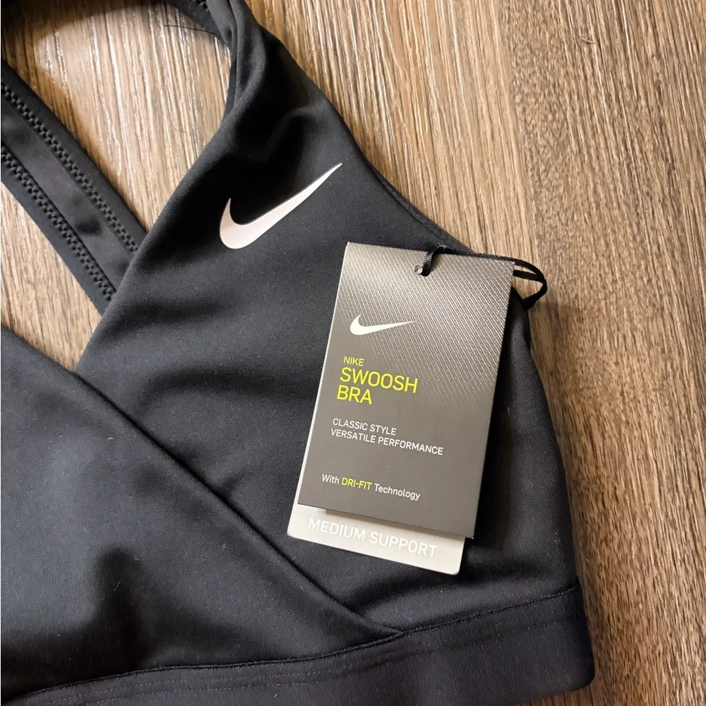 Nike Black Cross-Front Medium Support Sports Bra with White Swoosh - Picture 2 of 4